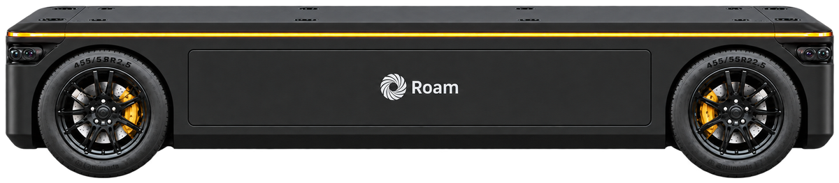 The Roam Carrier, empty, seen from the side, its amber light band running the full length